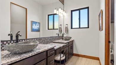 Golf course views - Resort-style pool & outdoor kitchen - on The Golf Club At Redlands Mesa in Colorado - for sale on GolfHomes.com, golf home, golf lot