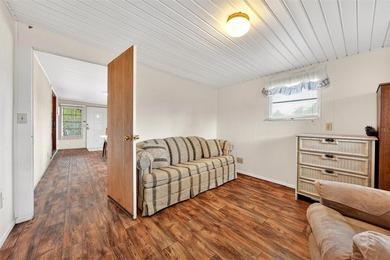 Perfectly positioned in the highly desirable community of on Bay Tree Golf Course in Florida - for sale on GolfHomes.com, golf home, golf lot