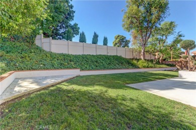 Discover this remarkable residence nestled in the beautiful on Anaheim Hills Golf Course in California - for sale on GolfHomes.com, golf home, golf lot