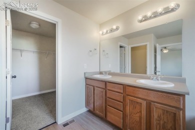 This impressive 3,350 sq. ft. two-story home in Meridian Ranch on Antler Creek Golf Course in Colorado - for sale on GolfHomes.com, golf home, golf lot