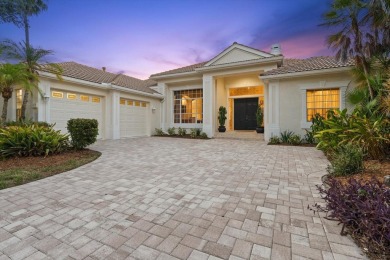 This exquisite four-bedroom home is majestically situated on the on University Park Country Club in Florida - for sale on GolfHomes.com, golf home, golf lot