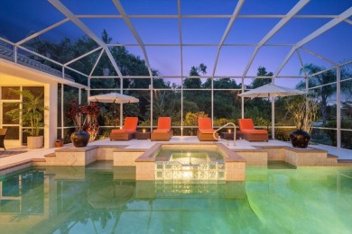 This exquisite four-bedroom home is majestically situated on the on University Park Country Club in Florida - for sale on GolfHomes.com, golf home, golf lot