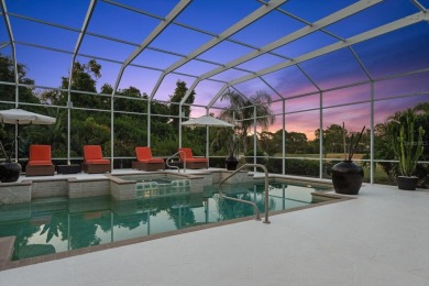 This exquisite four-bedroom home is majestically situated on the on University Park Country Club in Florida - for sale on GolfHomes.com, golf home, golf lot