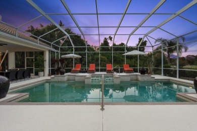 This exquisite four-bedroom home is majestically situated on the on University Park Country Club in Florida - for sale on GolfHomes.com, golf home, golf lot