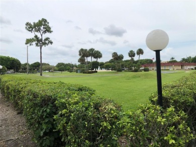 Step into this lovely 2-bedroom, 2-bathroom condo in the on Boca Dunes Golf and Country Club in Florida - for sale on GolfHomes.com, golf home, golf lot