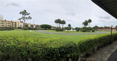 This lovely 2-bedroom, 2-bathroom condo in the desirable Boca on Boca Dunes Golf and Country Club in Florida - for sale on GolfHomes.com, golf home, golf lot