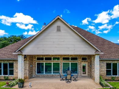 This beautiful custom home on the golf course in Hideaway Lake on Hide-A-Way Lake Golf Course in Texas - for sale on GolfHomes.com, golf home, golf lot