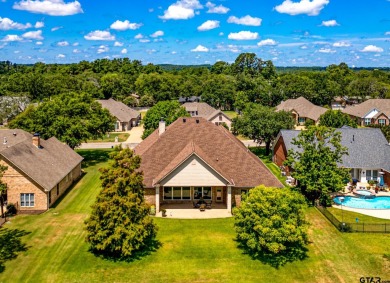 This beautiful custom home on the golf course in Hideaway Lake on Hide-A-Way Lake Golf Course in Texas - for sale on GolfHomes.com, golf home, golf lot