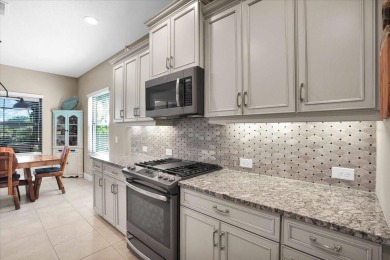 Welcome to your dream home in the highly sought-after Boca on Boca Royale Golf and Country Club in Florida - for sale on GolfHomes.com, golf home, golf lot