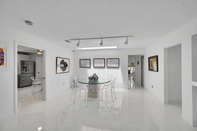 Elegant 3B/R 2 Bath villa. 2500 sq ft of living space. Lake view on Boca Lago Golf and Country Club in Florida - for sale on GolfHomes.com, golf home, golf lot