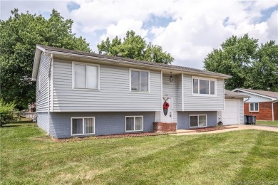 Step Into This Cute Bi-Level, Conveniently Located Near Wooded on Wooded View Golf Course in Indiana - for sale on GolfHomes.com, golf home, golf lot