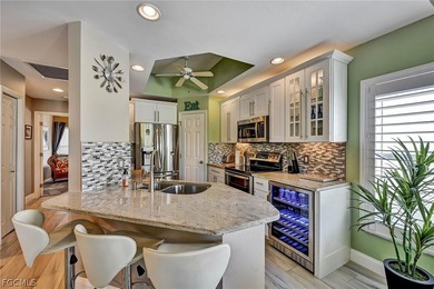 This beautiful 'TURNKEY END UNIT' condo is located in the on  in Florida - for sale on GolfHomes.com, golf home, golf lot