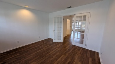 The seller is having a NEW ROOF installed in a few weeks. You on Forest Oaks Golf Club in Florida - for sale on GolfHomes.com, golf home, golf lot