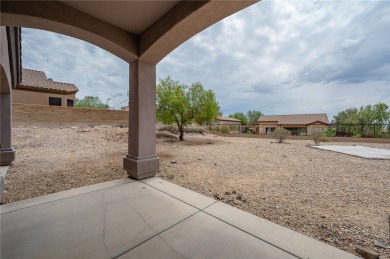 Spacious Living & Endless Possibilities in Laughlin Ranch on Laughlin Ranch Golf Club in Arizona - for sale on GolfHomes.com, golf home, golf lot