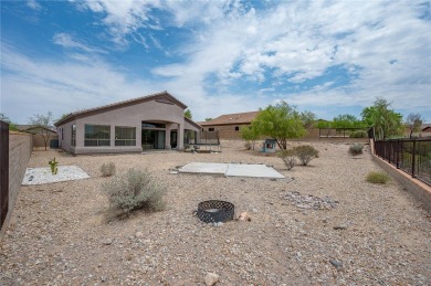 Spacious Living & Endless Possibilities in Laughlin Ranch on Laughlin Ranch Golf Club in Arizona - for sale on GolfHomes.com, golf home, golf lot