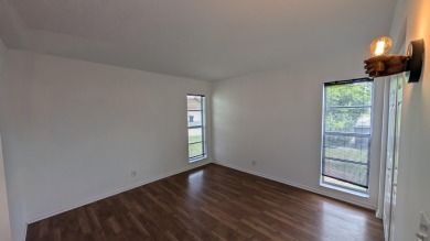 The seller is having a NEW ROOF installed in a few weeks. You on Forest Oaks Golf Club in Florida - for sale on GolfHomes.com, golf home, golf lot