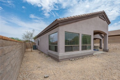 Spacious Living & Endless Possibilities in Laughlin Ranch on Laughlin Ranch Golf Club in Arizona - for sale on GolfHomes.com, golf home, golf lot