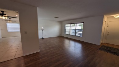 The seller is having a NEW ROOF installed in a few weeks. You on Forest Oaks Golf Club in Florida - for sale on GolfHomes.com, golf home, golf lot