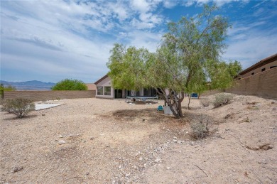 Spacious Living & Endless Possibilities in Laughlin Ranch on Laughlin Ranch Golf Club in Arizona - for sale on GolfHomes.com, golf home, golf lot