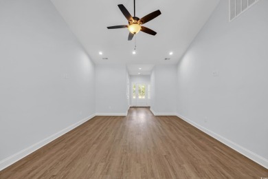 This cottage style home offers three bedrooms and two fully on Beachwood Golf Club in South Carolina - for sale on GolfHomes.com, golf home, golf lot