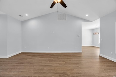 This cottage style home offers three bedrooms and two fully on Beachwood Golf Club in South Carolina - for sale on GolfHomes.com, golf home, golf lot