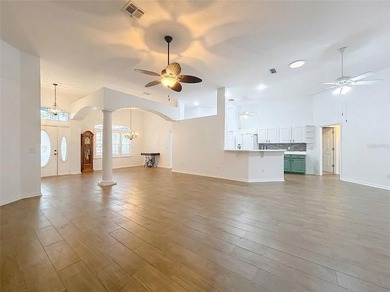 Welcome to this beautifully maintained 3-bedroom, 2-bath home on Lakes of Lady Lake Golf Course in Florida - for sale on GolfHomes.com, golf home, golf lot