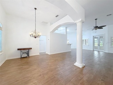 Welcome to this beautifully maintained 3-bedroom, 2-bath home on Lakes of Lady Lake Golf Course in Florida - for sale on GolfHomes.com, golf home, golf lot