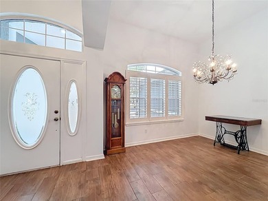 Welcome to this beautifully maintained 3-bedroom, 2-bath home on Lakes of Lady Lake Golf Course in Florida - for sale on GolfHomes.com, golf home, golf lot