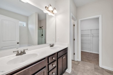 Move-in ready ranch home with upstairs bonus room, large on Riverwood Golf and Athletic Club in North Carolina - for sale on GolfHomes.com, golf home, golf lot