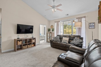 Welcome to this charming 2 bedroom, 2 bathroom top-floor condo on Barefoot Resort and Golf Club  in South Carolina - for sale on GolfHomes.com, golf home, golf lot