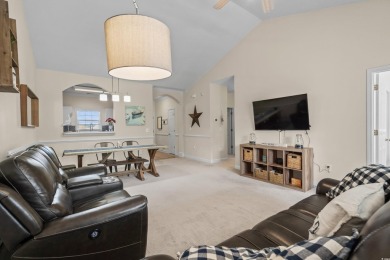 Welcome to this charming 2 bedroom, 2 bathroom top-floor condo on Barefoot Resort and Golf Club  in South Carolina - for sale on GolfHomes.com, golf home, golf lot