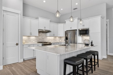 PUNTA GORDA ISLES! STUNNING 3 BEDROOM PLUS OFFICE, 2.5 BATH on Saint Andrews South Golf Club in Florida - for sale on GolfHomes.com, golf home, golf lot