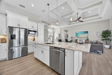 PUNTA GORDA ISLES! STUNNING 3 BEDROOM PLUS OFFICE, 2.5 BATH on Saint Andrews South Golf Club in Florida - for sale on GolfHomes.com, golf home, golf lot