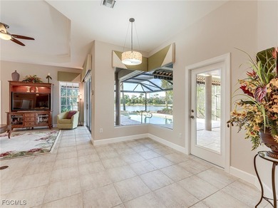 Lakefront, golf view, total storm protection, plus a 2-car on Crown Colony Golf and Country Club in Florida - for sale on GolfHomes.com, golf home, golf lot