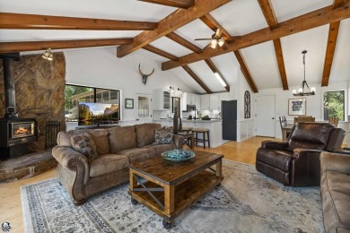 Enjoy serene views of the ridgeline through the pines and cedars on Pine Mountain Lake Country Club in California - for sale on GolfHomes.com, golf home, golf lot