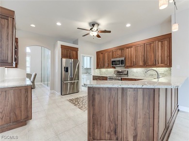 Lakefront, golf view, total storm protection, plus a 2-car on Crown Colony Golf and Country Club in Florida - for sale on GolfHomes.com, golf home, golf lot