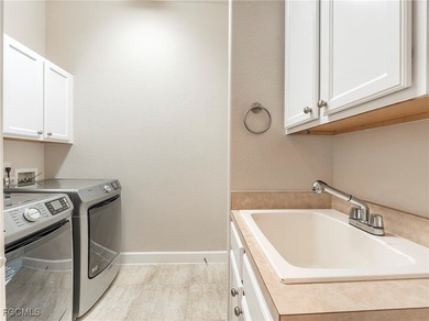 Lakefront, golf view, total storm protection, plus a 2-car on Crown Colony Golf and Country Club in Florida - for sale on GolfHomes.com, golf home, golf lot