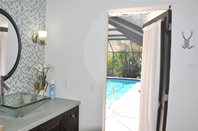 Stunning Move-In Ready Custom Home with Golf Course Views in on Twin Isles Country Club in Florida - for sale on GolfHomes.com, golf home, golf lot