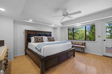 Enjoy serene views of the ridgeline through the pines and cedars on Pine Mountain Lake Country Club in California - for sale on GolfHomes.com, golf home, golf lot