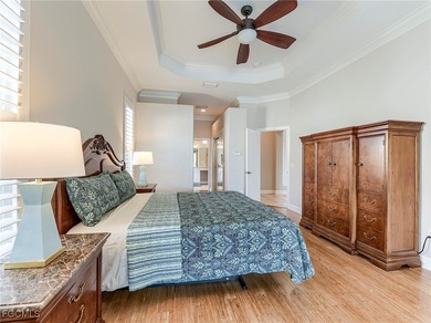 Lakefront, golf view, total storm protection, plus a 2-car on Crown Colony Golf and Country Club in Florida - for sale on GolfHomes.com, golf home, golf lot