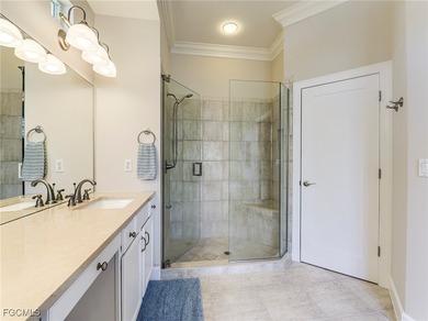 Lakefront, golf view, total storm protection, plus a 2-car on Crown Colony Golf and Country Club in Florida - for sale on GolfHomes.com, golf home, golf lot