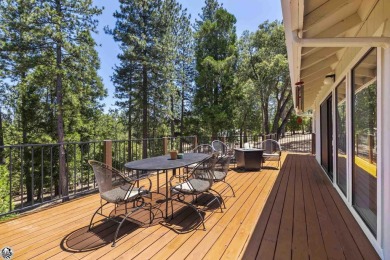 Enjoy serene views of the ridgeline through the pines and cedars on Pine Mountain Lake Country Club in California - for sale on GolfHomes.com, golf home, golf lot