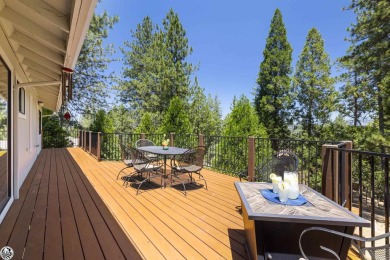 Enjoy serene views of the ridgeline through the pines and cedars on Pine Mountain Lake Country Club in California - for sale on GolfHomes.com, golf home, golf lot