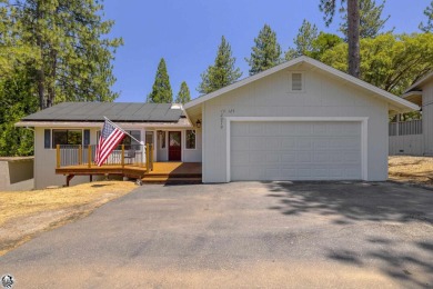 Enjoy serene views of the ridgeline through the pines and cedars on Pine Mountain Lake Country Club in California - for sale on GolfHomes.com, golf home, golf lot