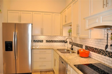 Stunning Move-In Ready Custom Home with Golf Course Views in on Twin Isles Country Club in Florida - for sale on GolfHomes.com, golf home, golf lot