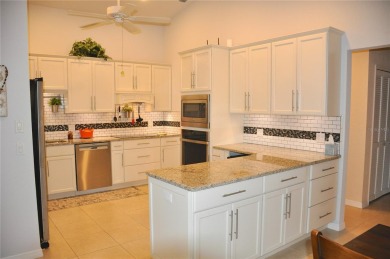 Stunning Move-In Ready Custom Home with Golf Course Views in on Twin Isles Country Club in Florida - for sale on GolfHomes.com, golf home, golf lot