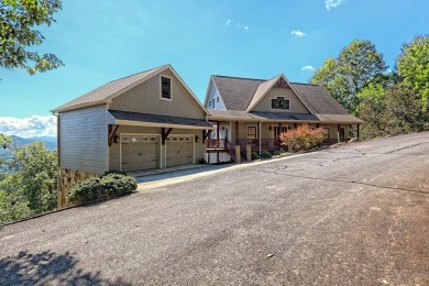 Indulge in breathtaking views from the moment you step foot in on Chatuge Shores Golf Course in North Carolina - for sale on GolfHomes.com, golf home, golf lot