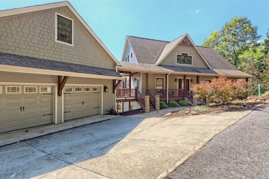 Indulge in breathtaking views from the moment you step foot in on Chatuge Shores Golf Course in North Carolina - for sale on GolfHomes.com, golf home, golf lot