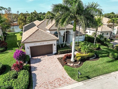 Lakefront, golf view, total storm protection, plus a 2-car on Crown Colony Golf and Country Club in Florida - for sale on GolfHomes.com, golf home, golf lot