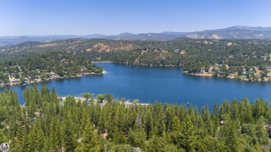 Enjoy serene views of the ridgeline through the pines and cedars on Pine Mountain Lake Country Club in California - for sale on GolfHomes.com, golf home, golf lot